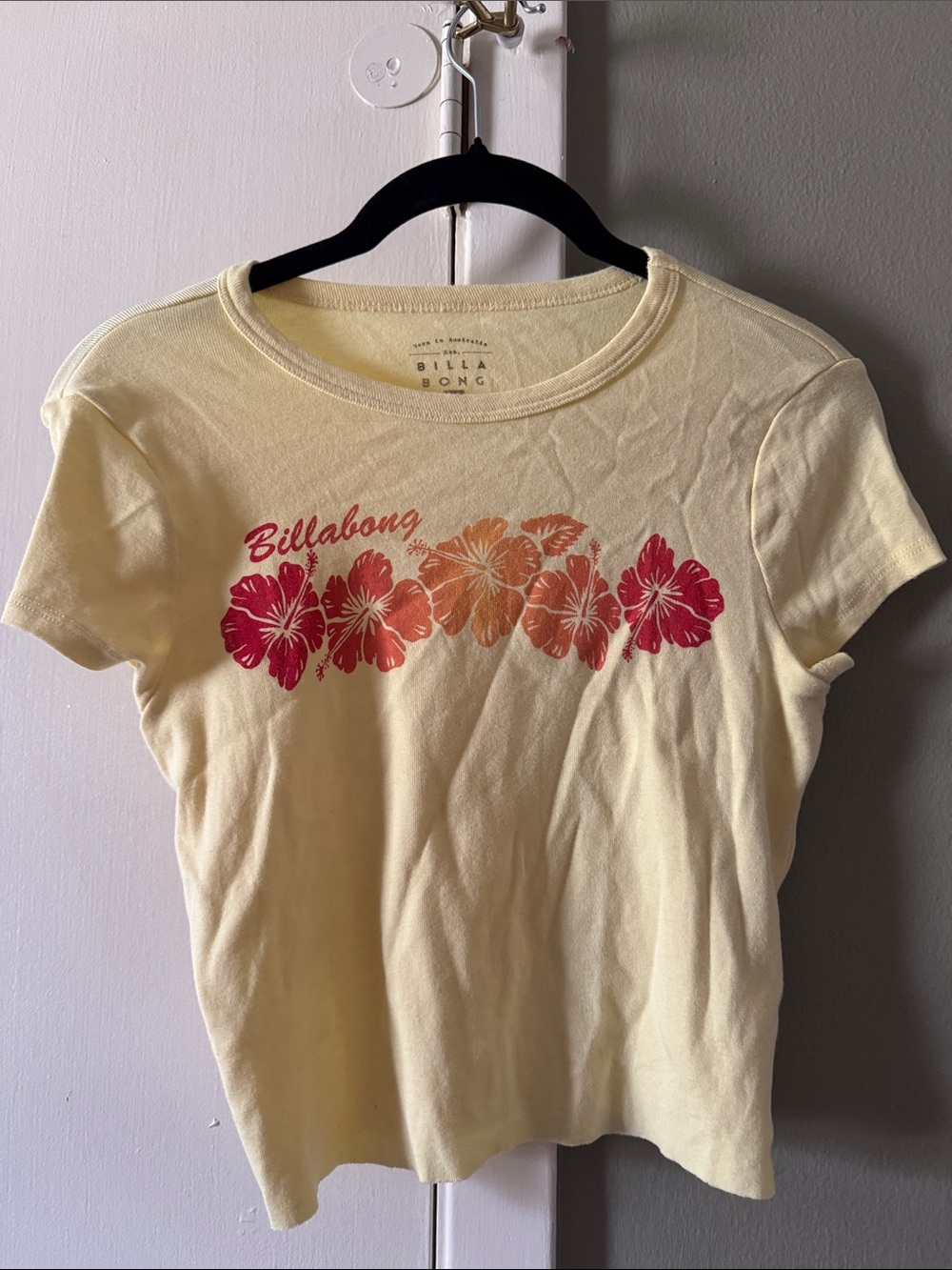 Billabong Pale Yellow Crop Tee with Red-Orange Hibiscus Print